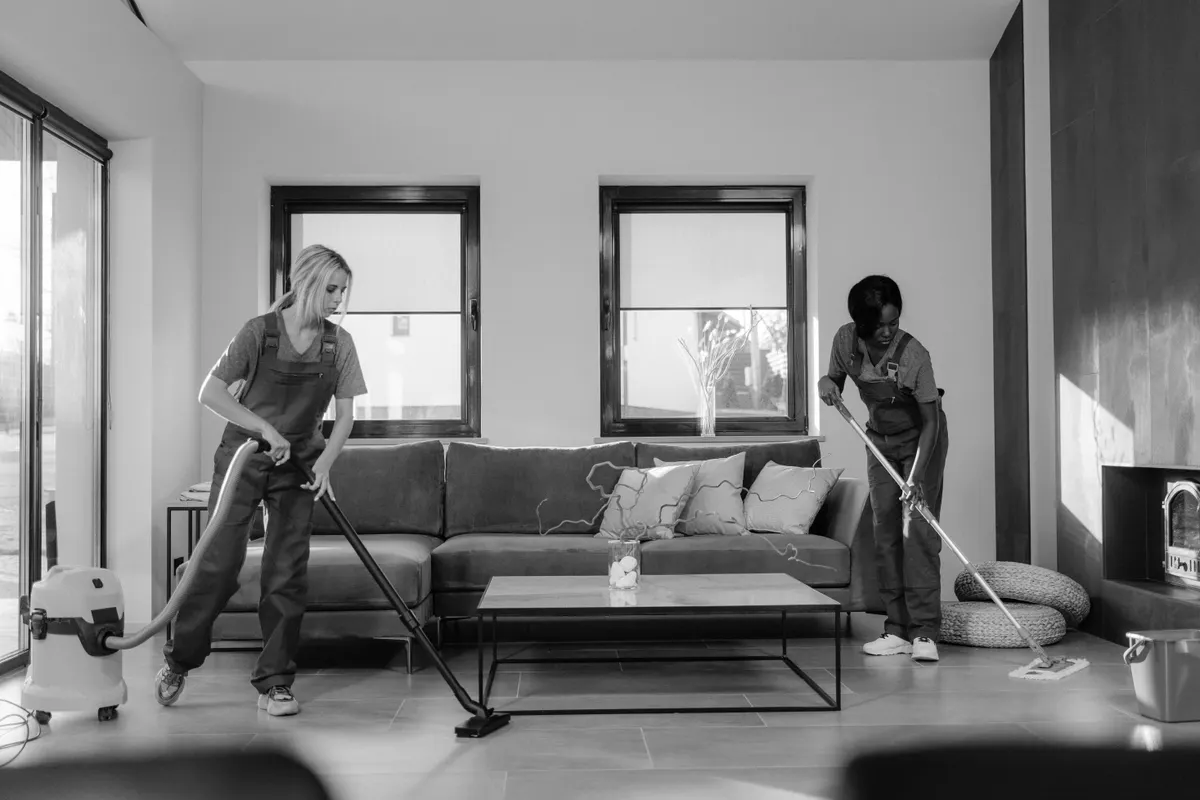 Cleaning crew working in an office lounge