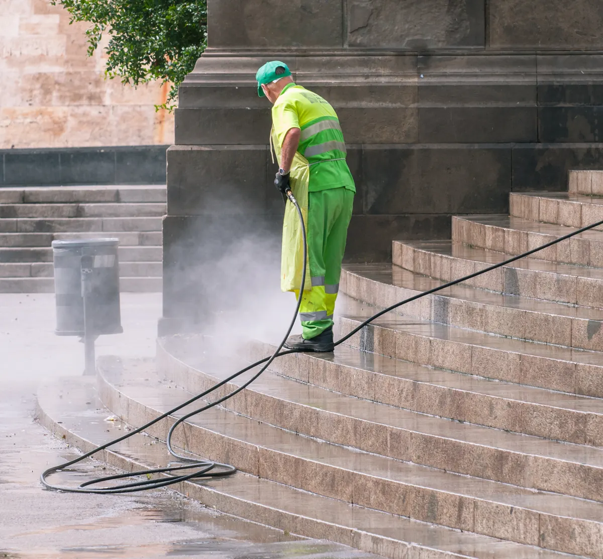 Pressure washing exterior concrete steps